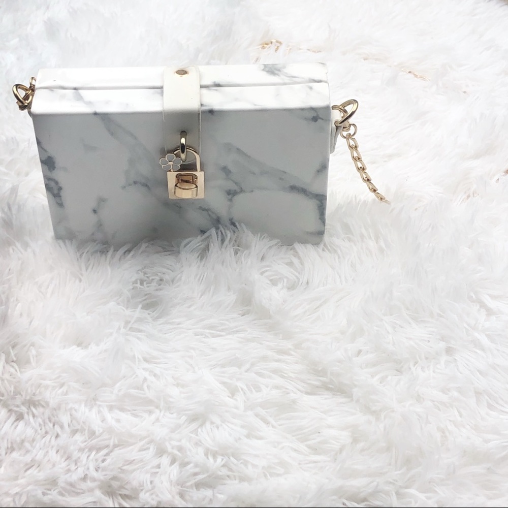 Marble clutch with gold chain